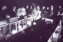 John Cage and the audience on the platform constructed for the Variations VII, 1966, still from a video. Copyright E.A.T. Foundation